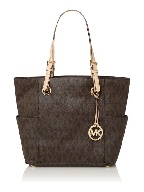 michael kors jet set monogram large|michael kors jet set.